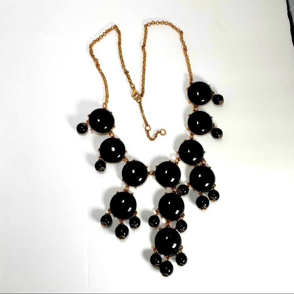 Black bold necklace with gold tone chain